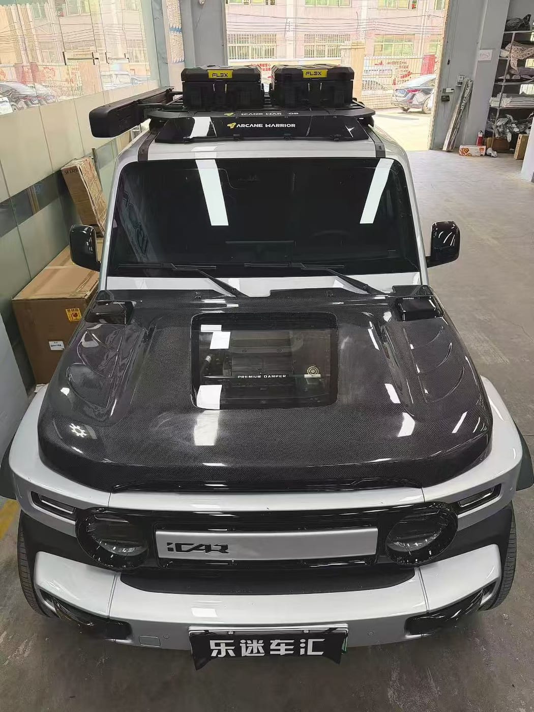 Carbon fiber hood installed on an iCAR V23